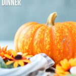 Image of pumpkin and flowers. Learn how to host thanksgiving on a budget. Text overlay reads, "How to Budget for Thanksgiving Dinner"